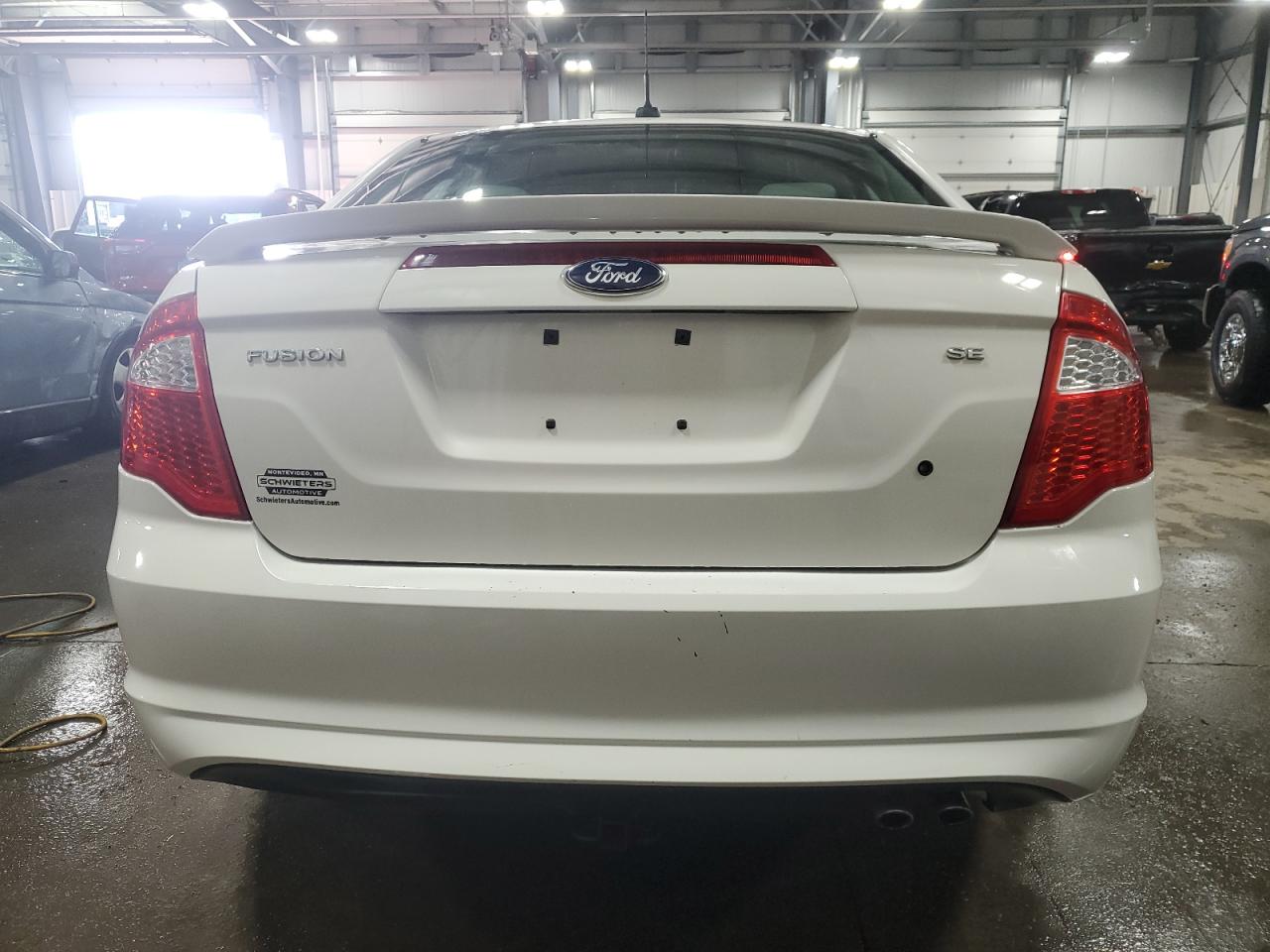 2012 Ford Fusion VIN 3FAHP0HA7CR339277 Copart auction photo, side damage thumbnail 6