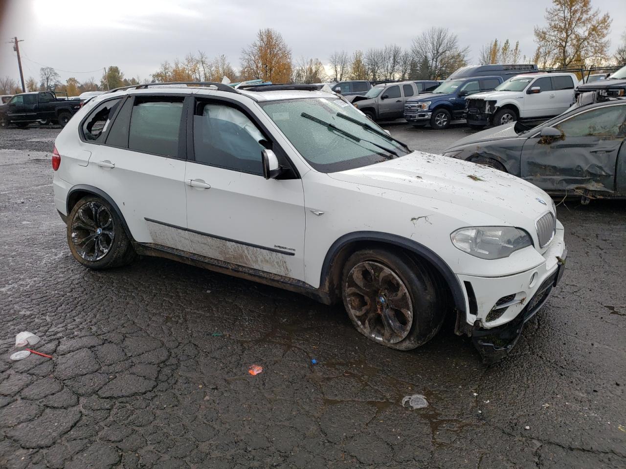 2012 BMW X5 VIN 5UXZV8C57CL422167 Copart auction photo, rollover damage thumbnail 4