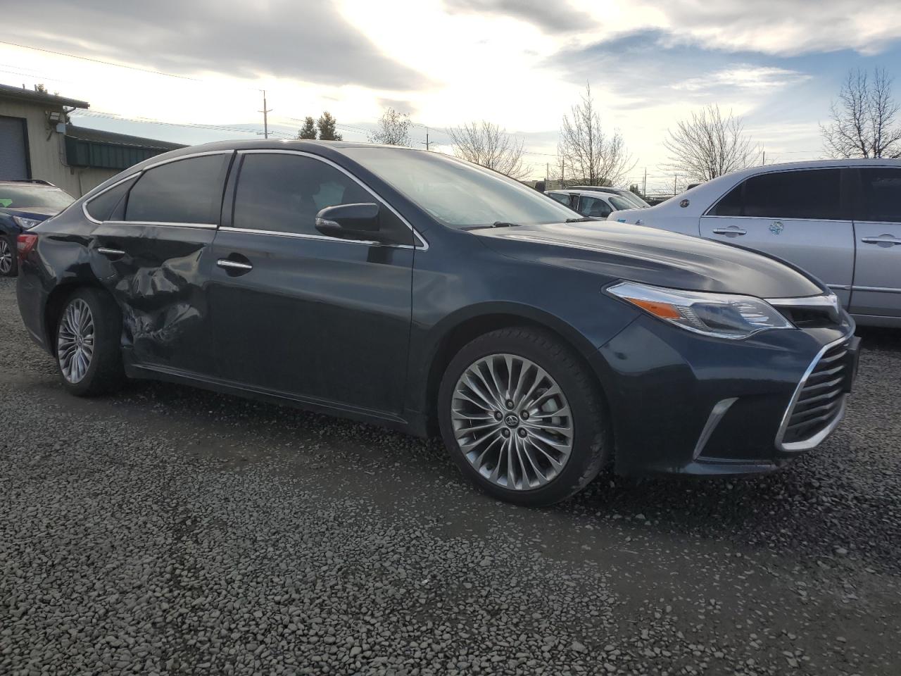 2016 Toyota Avalon VIN 4T1BK1EB7GU229552 Copart auction photo, rear end / side damage thumbnail 4