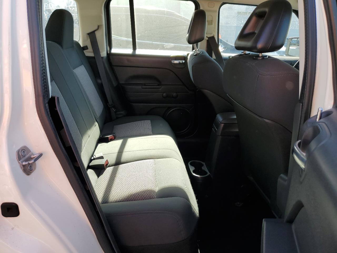 2009 Jeep Liberty (Patriot) VIN 1J4FT28A59D140653 Copart auction photo, rear end / stripped damage thumbnail 11