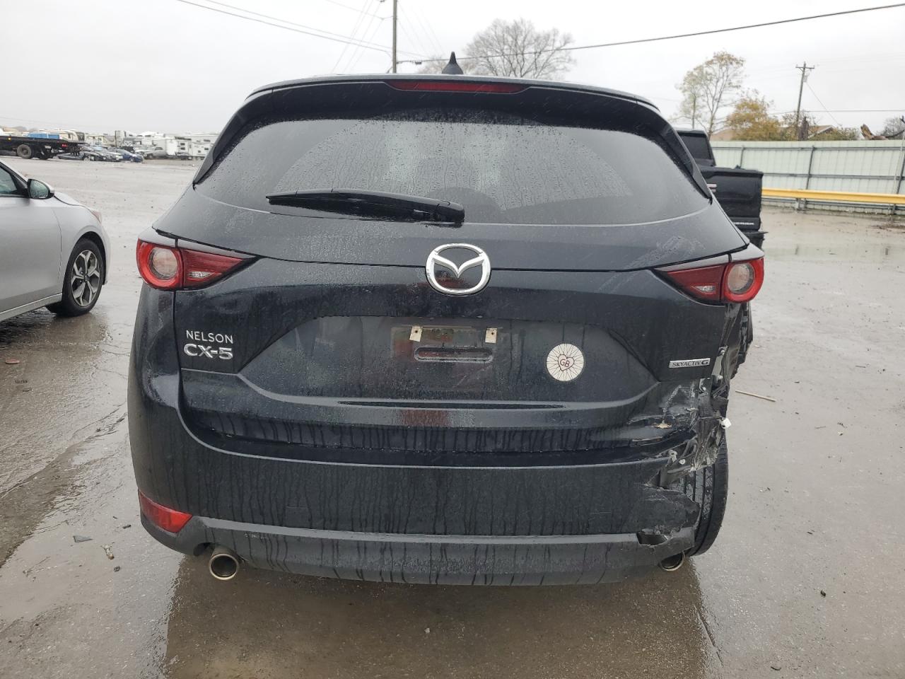2021 Mazda CX-5 VIN JM3KFACM3M0361358 Copart auction photo, rear end damage thumbnail 6