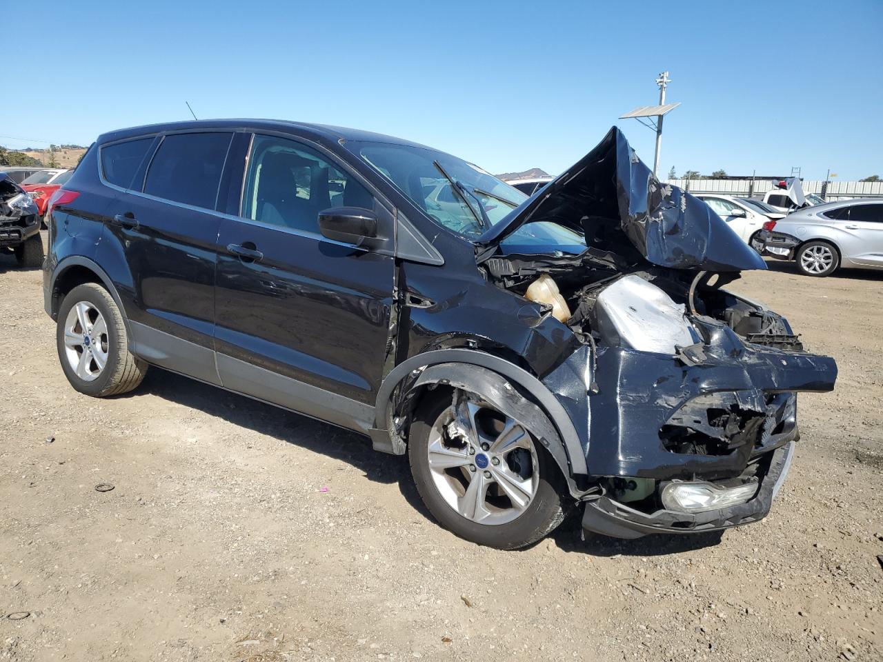 2015 Ford Escape VIN 1FMCU0GX8FUB07654 Copart auction photo, front end / side damage thumbnail 4
