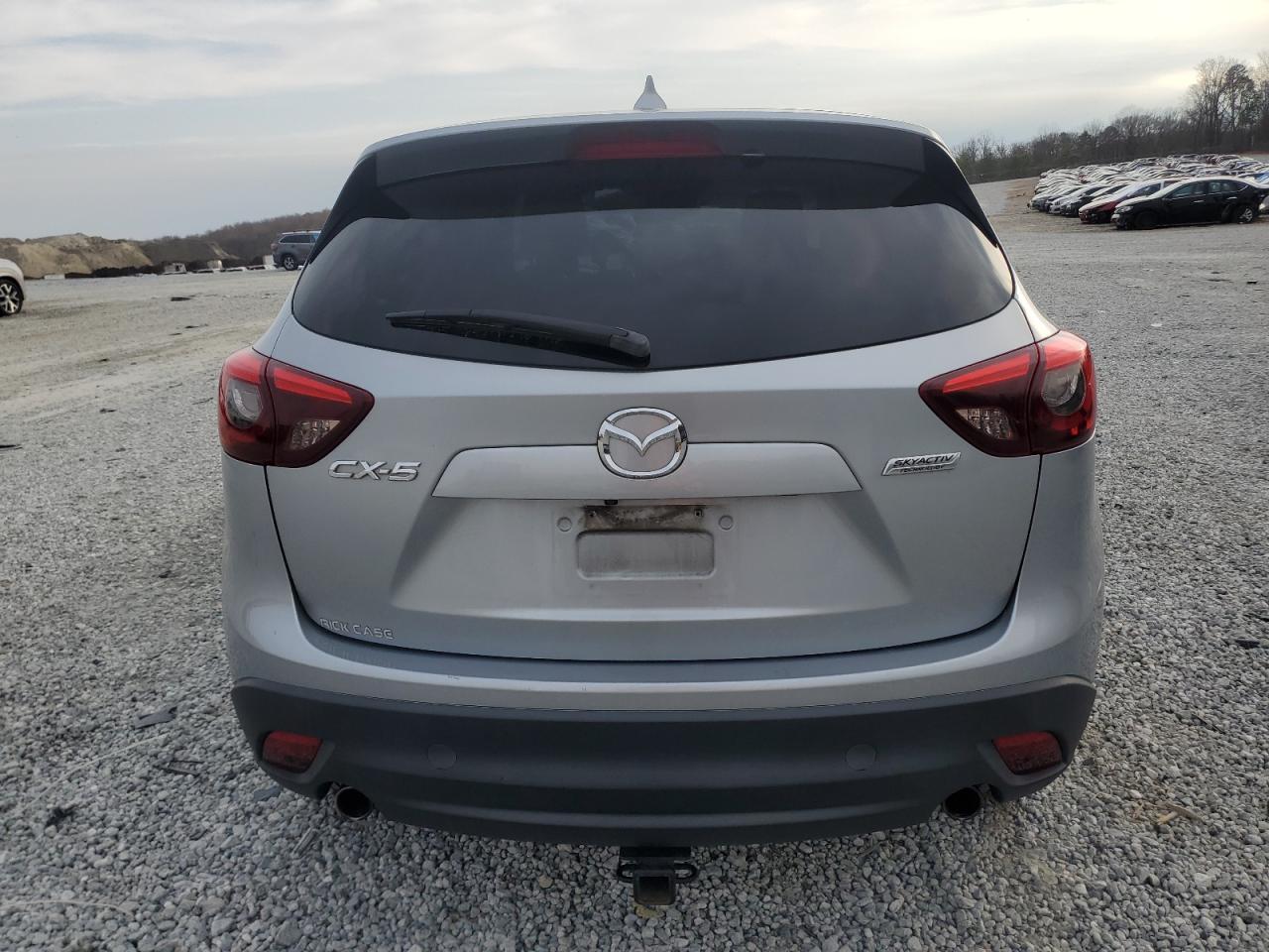 2016 Mazda CX-5 VIN JM3KE2DY7G0781056 Copart auction photo, front end / side damage thumbnail 6