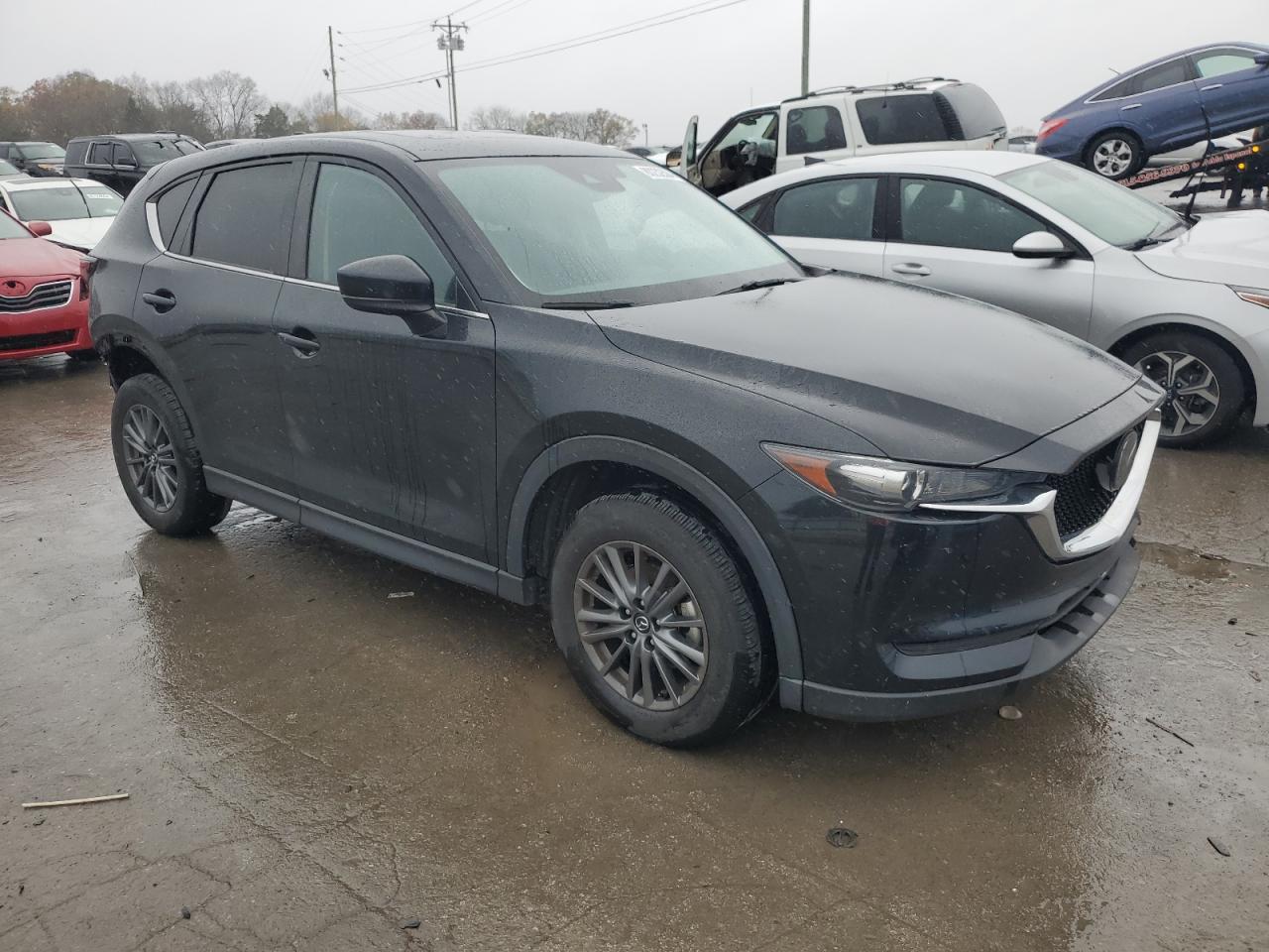 2021 Mazda CX-5 VIN JM3KFACM3M0361358 Copart auction photo, rear end damage thumbnail 4