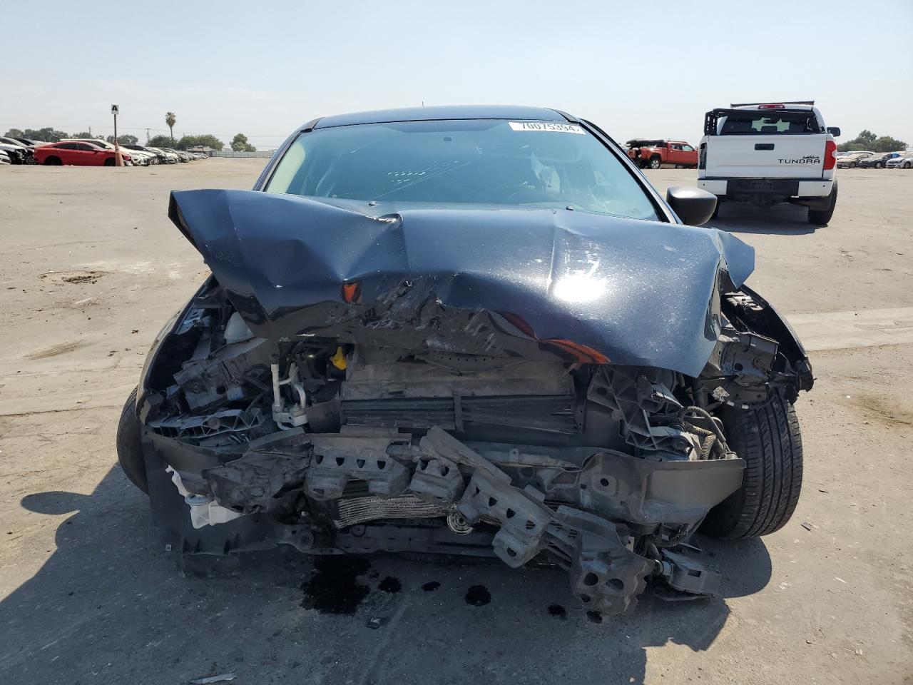 2017 Ford Focus VIN 1FADP3E29HL211044 Copart auction photo, all over damage thumbnail 5