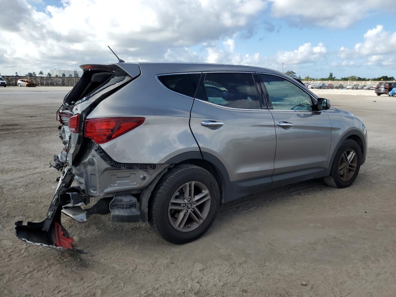 2018 Hyundai Santa Fe VIN 5NMZTDLB4JH104611 Copart auction photo, rear end damage thumbnail 3