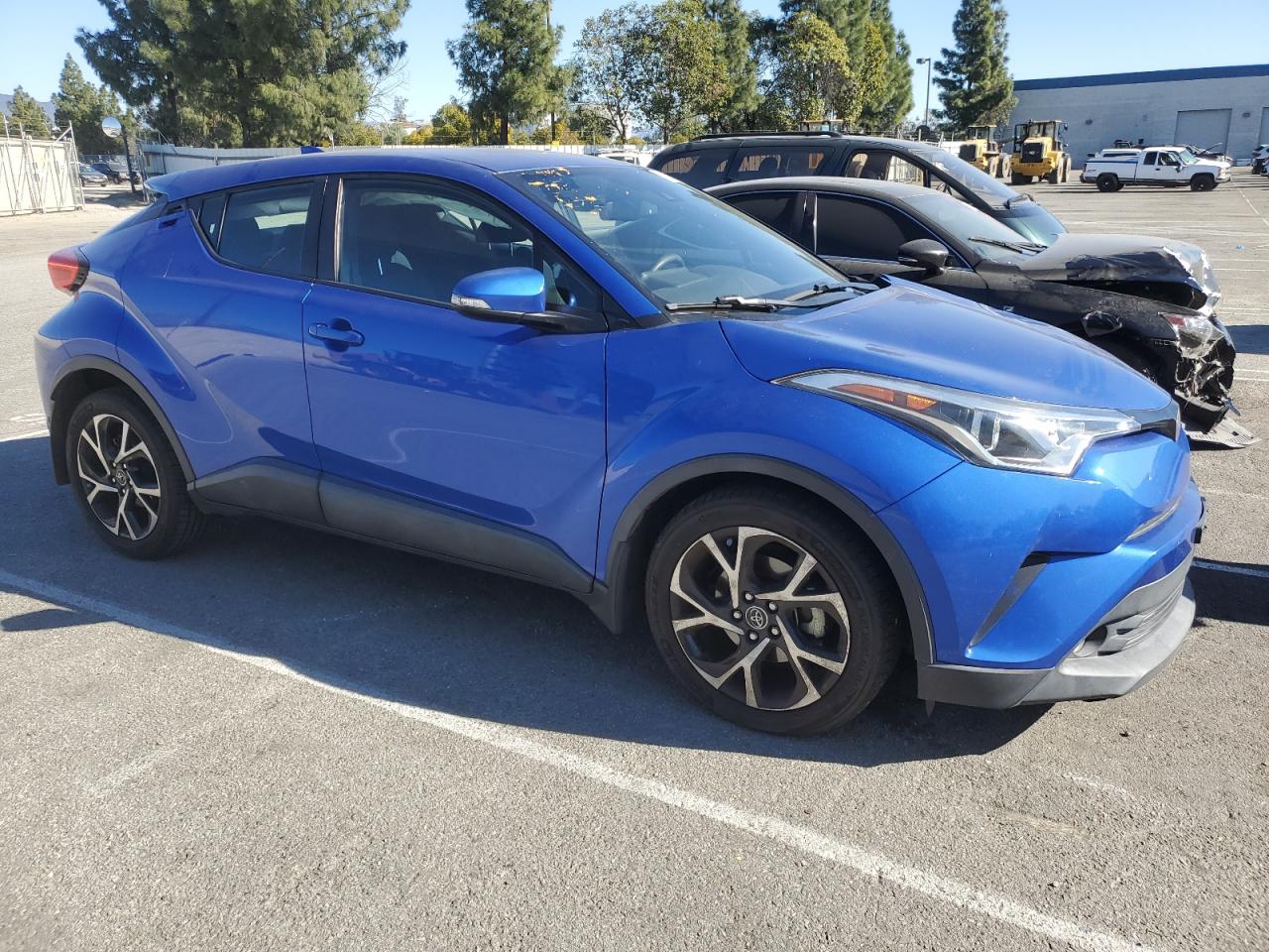 2018 Toyota C-HR VIN NMTKHMBX8JR062682 Copart auction photo, front end / side damage thumbnail 4