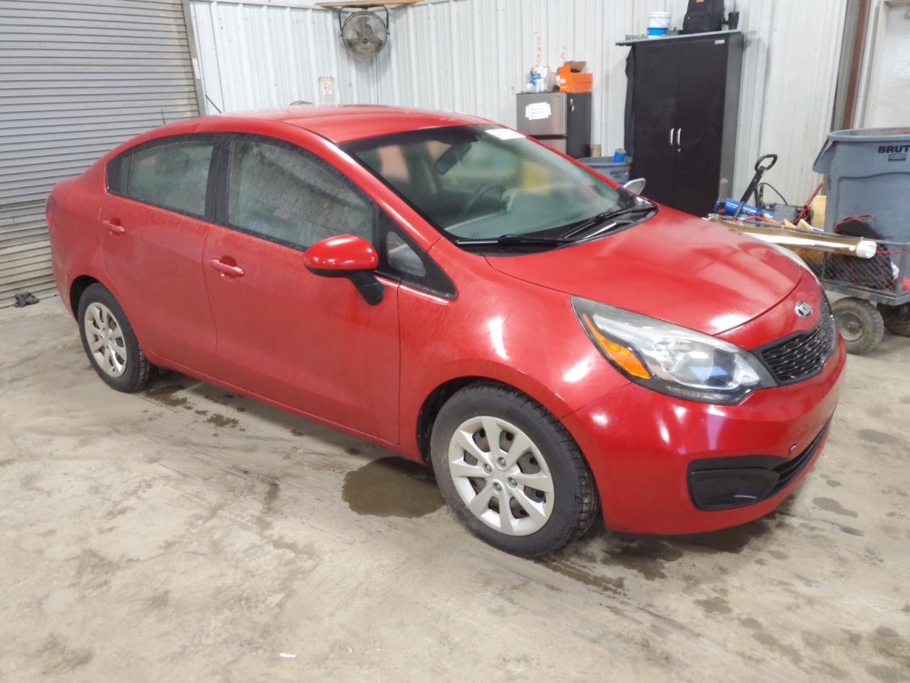 2015 KIA Rio VIN KNADM4A31F6453228 Copart auction photo, minor dent/scratches damage thumbnail 4