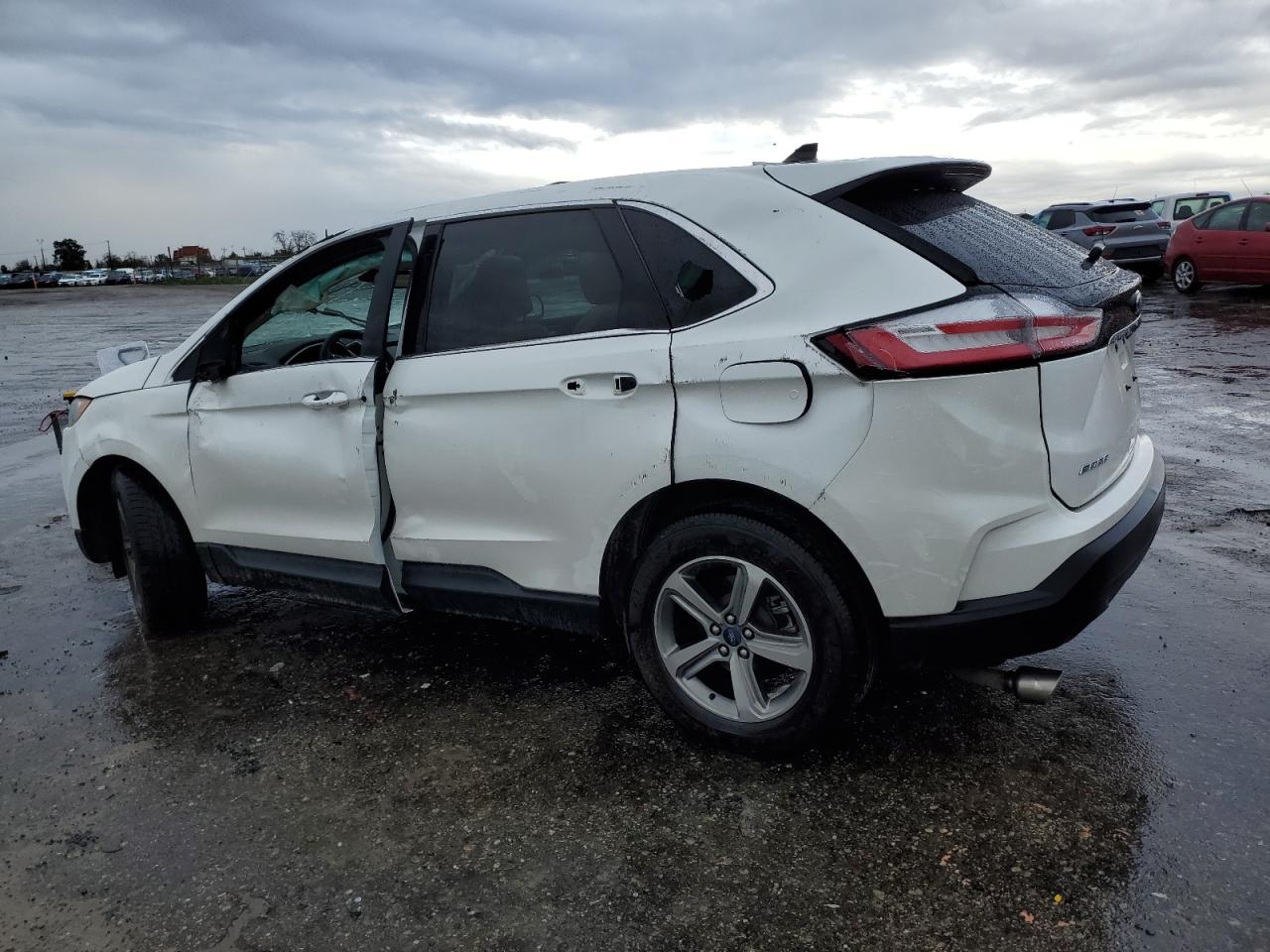 2020 Ford Edge VIN 2FMPK3J98LBB52372 Copart auction photo, rollover damage thumbnail 2