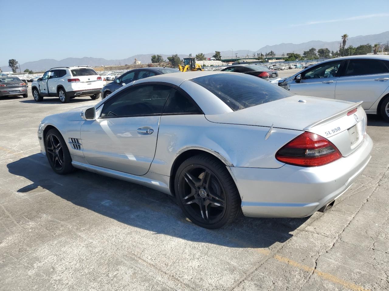 2009 Mercedes-Benz SL-klasse VIN WDBSK71F09F143733 Copart auction photo, side damage thumbnail 2