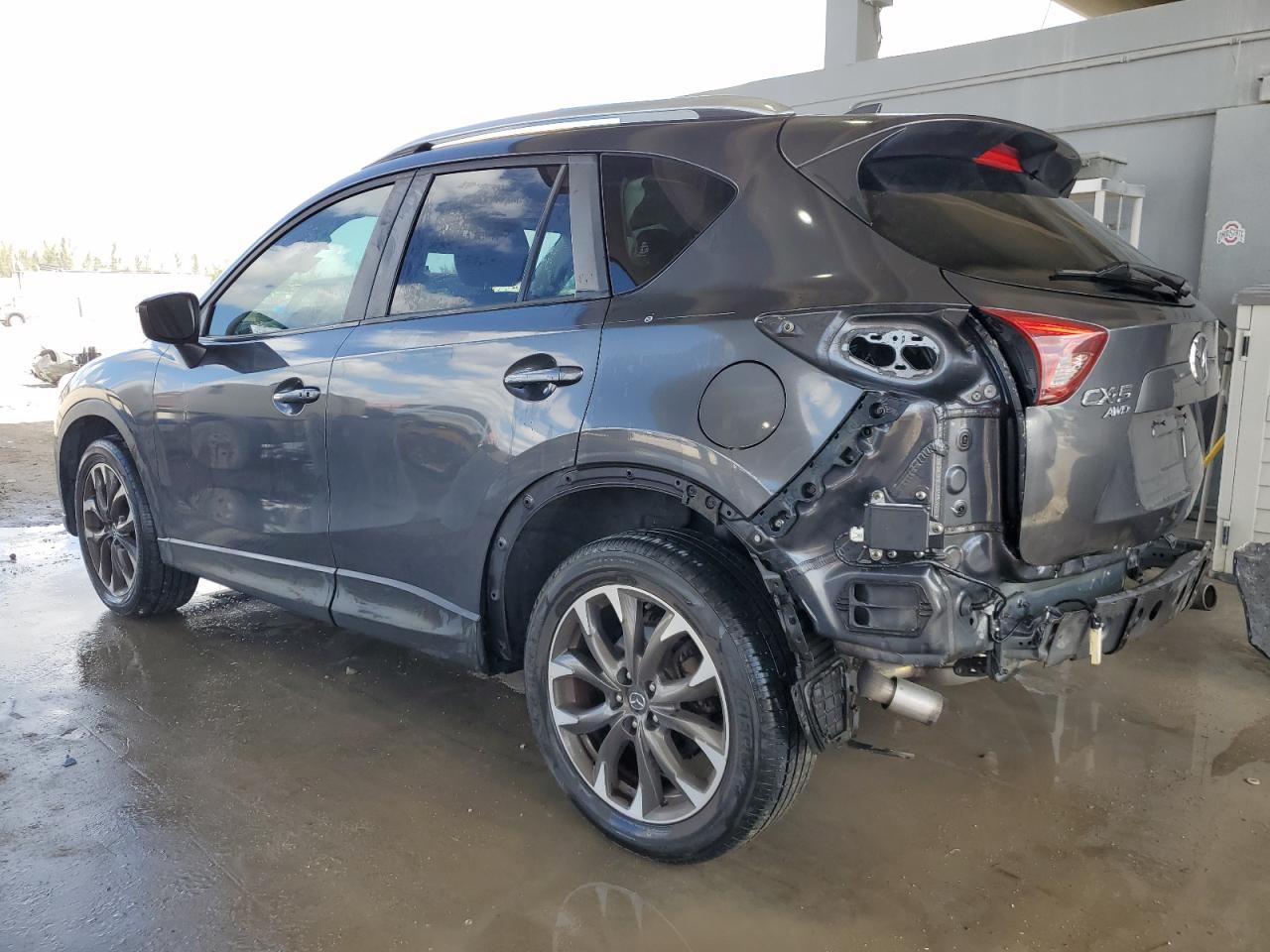 2016 Mazda CX-5 VIN JM3KE4DY4G0616206 Copart auction photo, rear end / minor dent/scratches damage thumbnail 2
