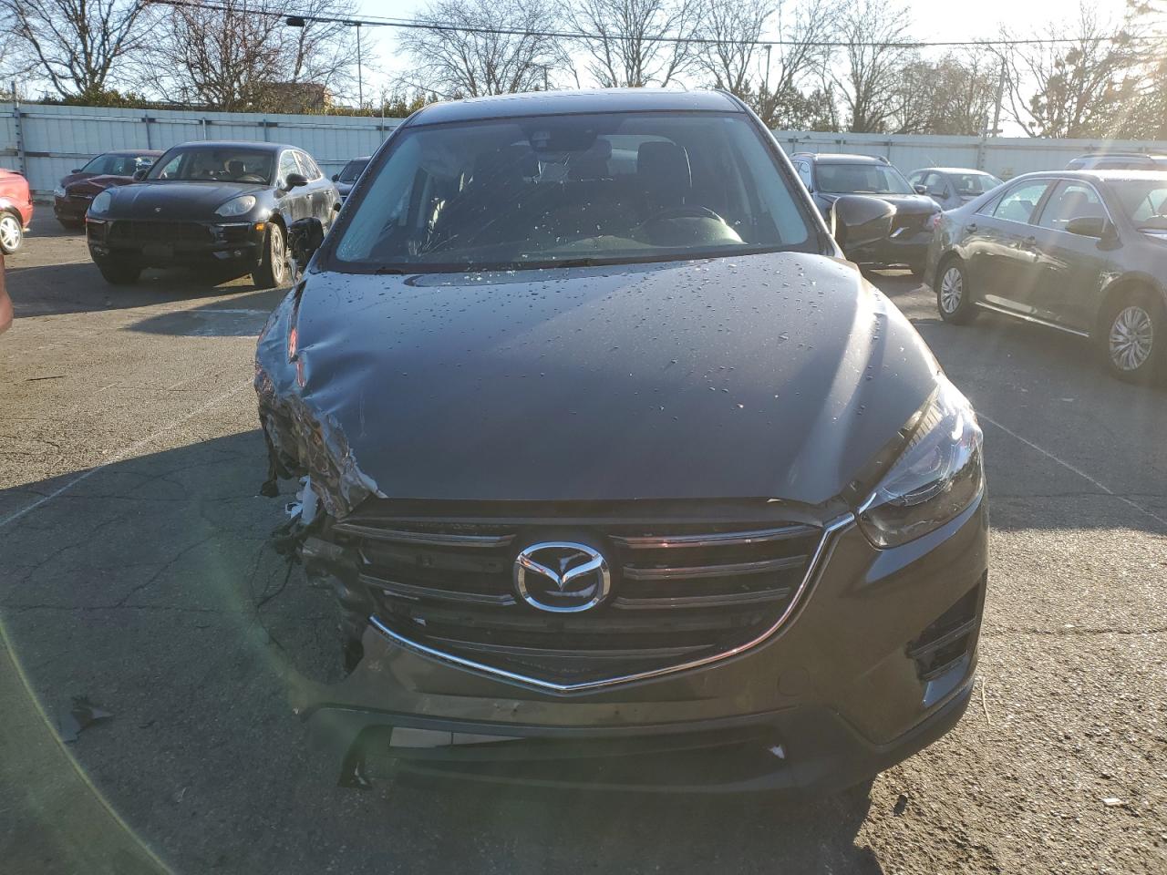 2016 Mazda CX-5 VIN JM3KE4DY3G0722887 Copart auction photo, all over / undercarriage damage thumbnail 5