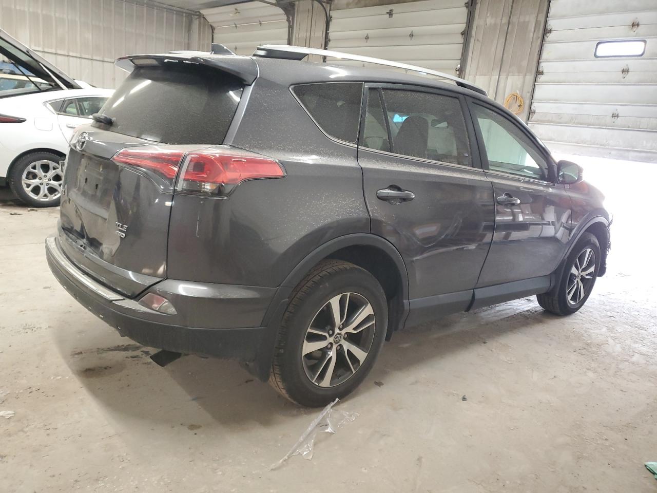 2017 Toyota RAV 4 VIN 2T3RFREV6HW668648 Copart auction photo, front end damage thumbnail 3