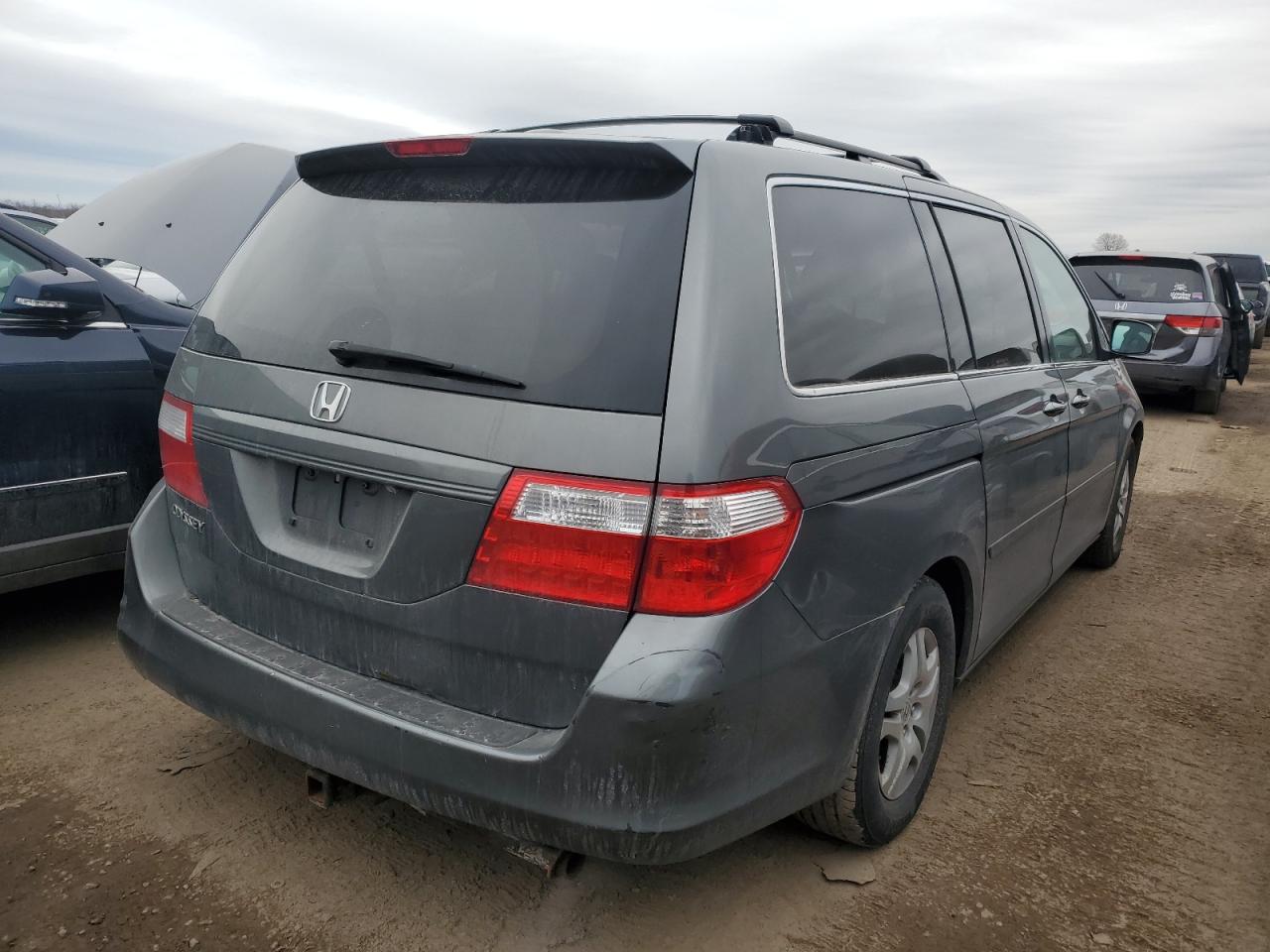2007 Honda Odyssey VIN 5FNRL38797B097051 Copart auction photo, rear end / minor dent/scratches damage thumbnail 3