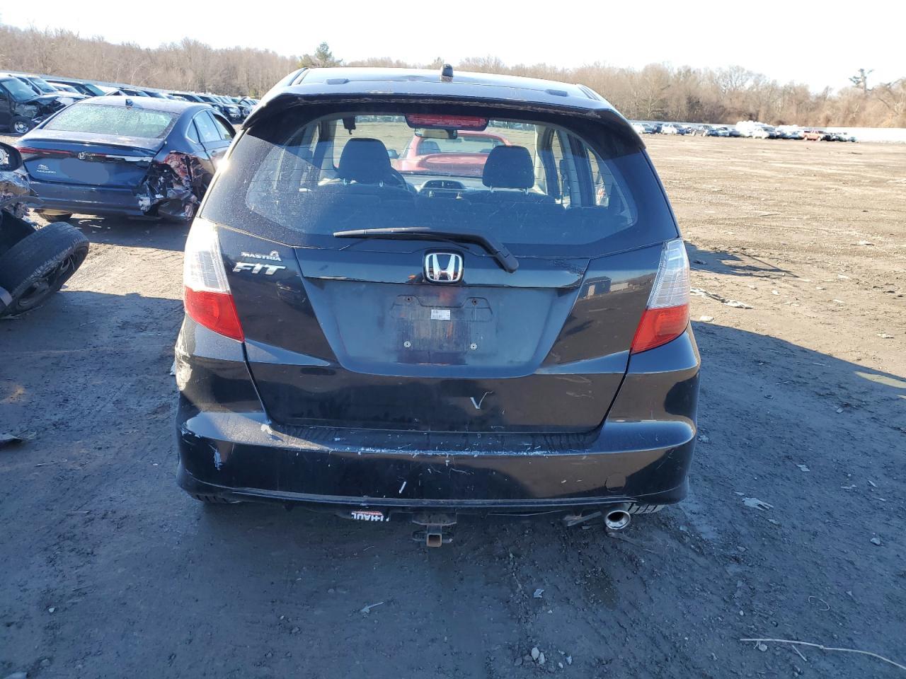 2010 Honda Fit VIN JHMGE8H65AC012084 Copart auction photo, side / rear end damage thumbnail 6