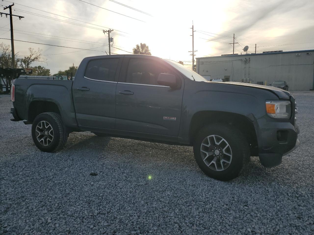 2016 GMC Canyon VIN 1GTG6CE35G1370091 Copart auction photo, front end / side damage thumbnail 4