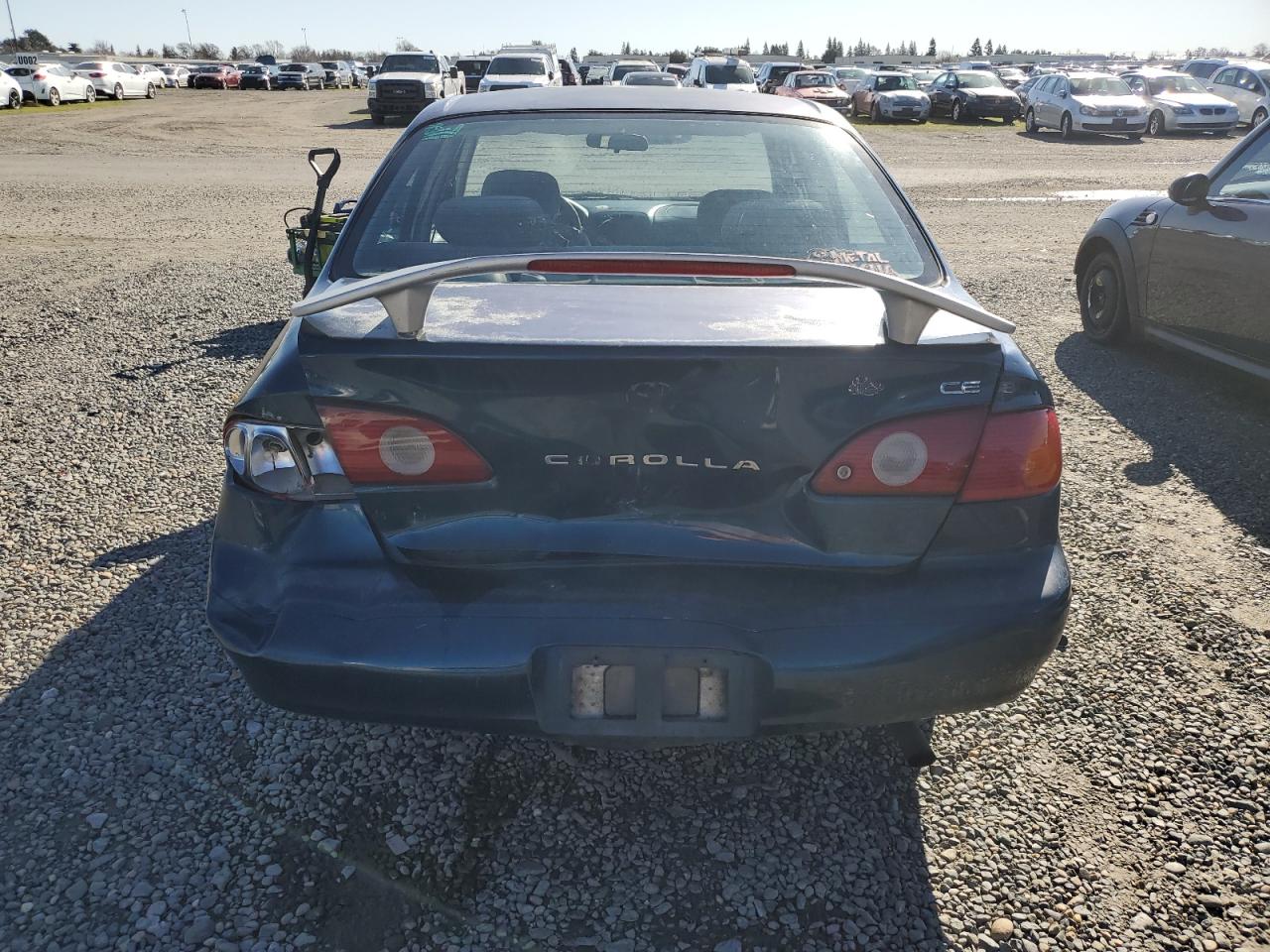 2001 Toyota Corolla VIN 1NXBR12E31Z522639 Copart auction photo, rear end / front end damage thumbnail 6