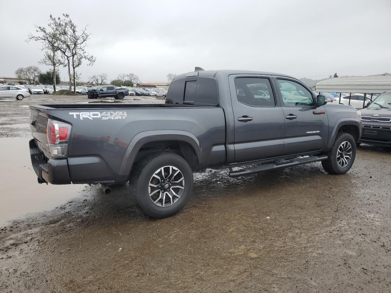 2021 Toyota Tacoma VIN 3TMDZ5BN9MM110528 Copart auction photo, side damage thumbnail 3