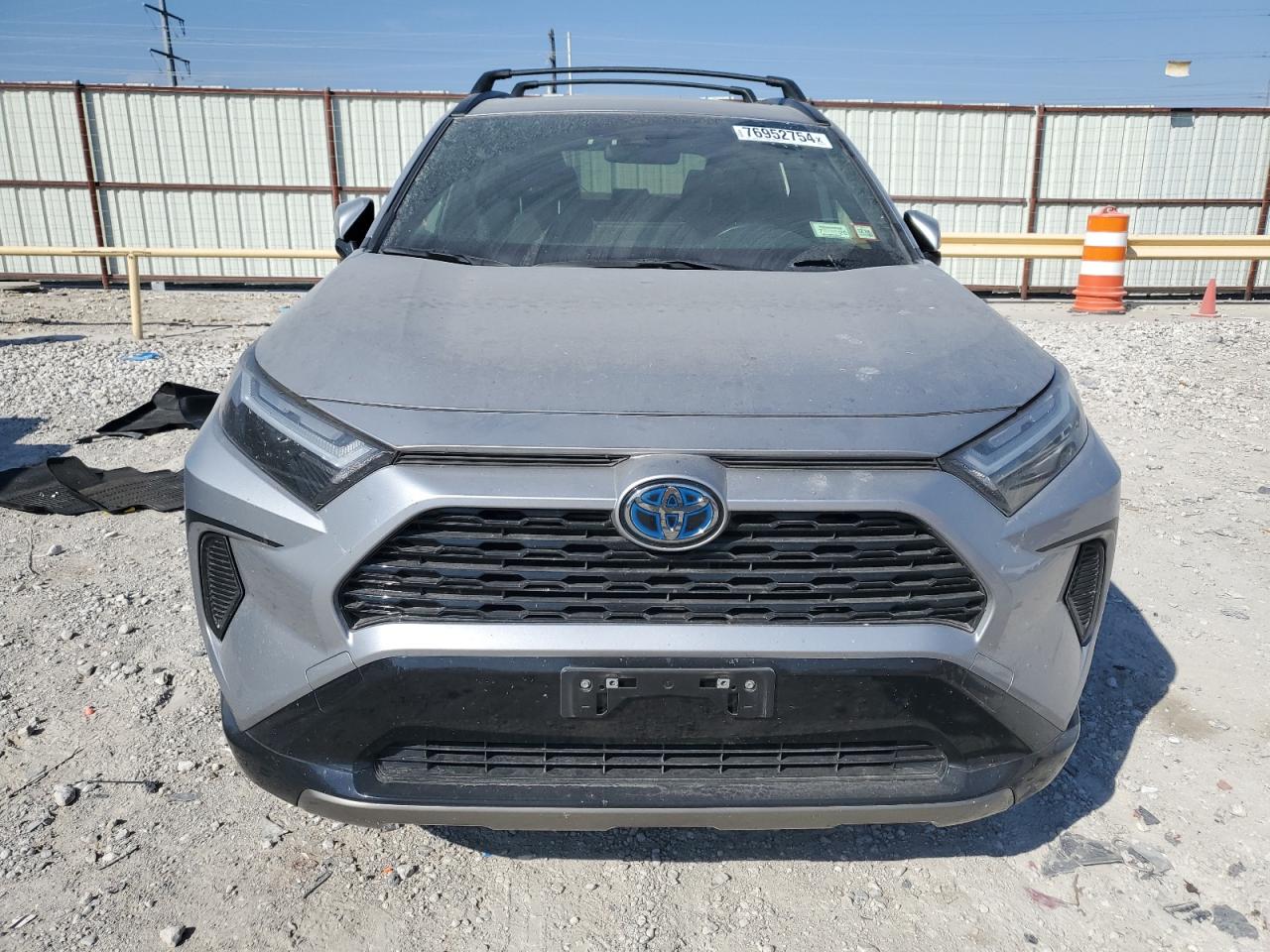 2023 Toyota RAV 4 VIN JTM16RFV1PD079708 Copart auction photo, side / mechanical damage thumbnail 5