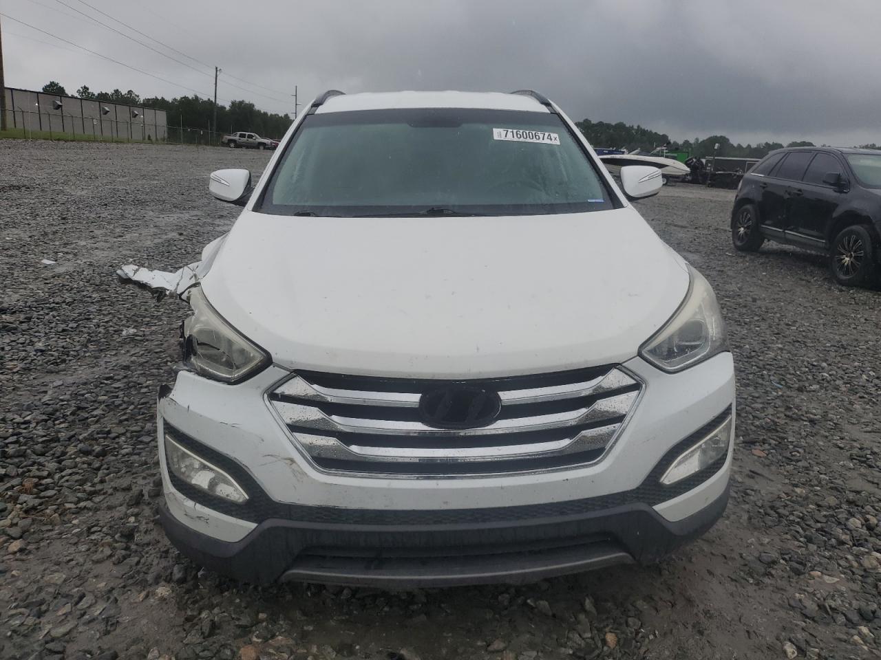 2014 Hyundai Santa Fe VIN 5XYZU3LA9EG189623 Copart auction photo, front end / undercarriage damage thumbnail 5