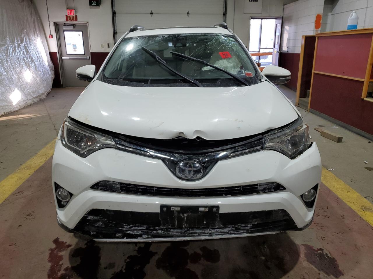 2018 Toyota RAV 4 VIN JTMRFREV3JJ741382 Copart auction photo, side / front end damage thumbnail 5