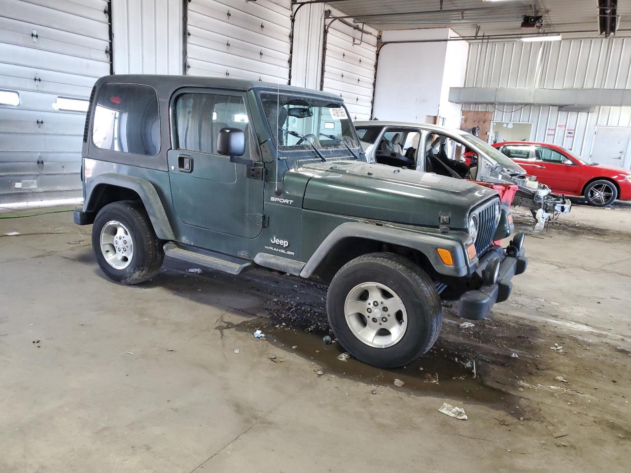 2003 Jeep Wrangler VIN 1J4FA49S63P345929 Copart auction photo, normal wear damage thumbnail 4