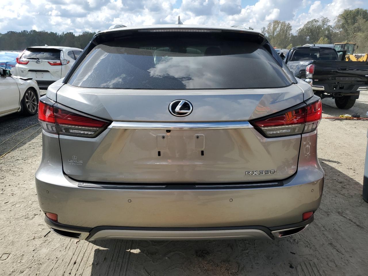 2020 Lexus RX VIN 2T2JZMAA3LC167550 Copart auction photo, side / minor dent/scratches damage thumbnail 6