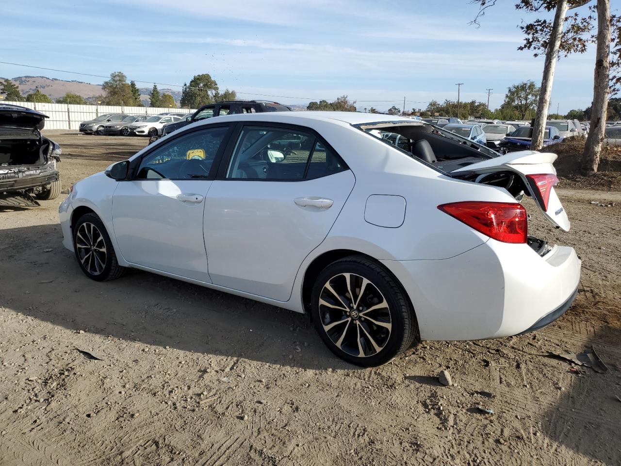 2017 Toyota Corolla VIN 5YFBURHE5HP584673 Copart auction photo, rear end damage thumbnail 2