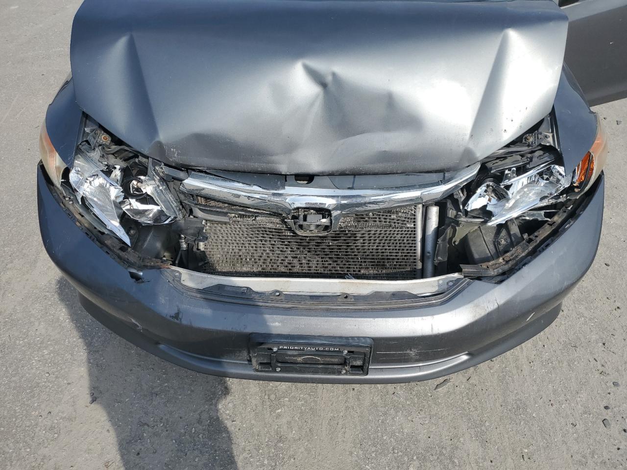 2012 Honda Civic VIN 19XFB2F51CE020157 Copart auction photo, front end damage thumbnail 11