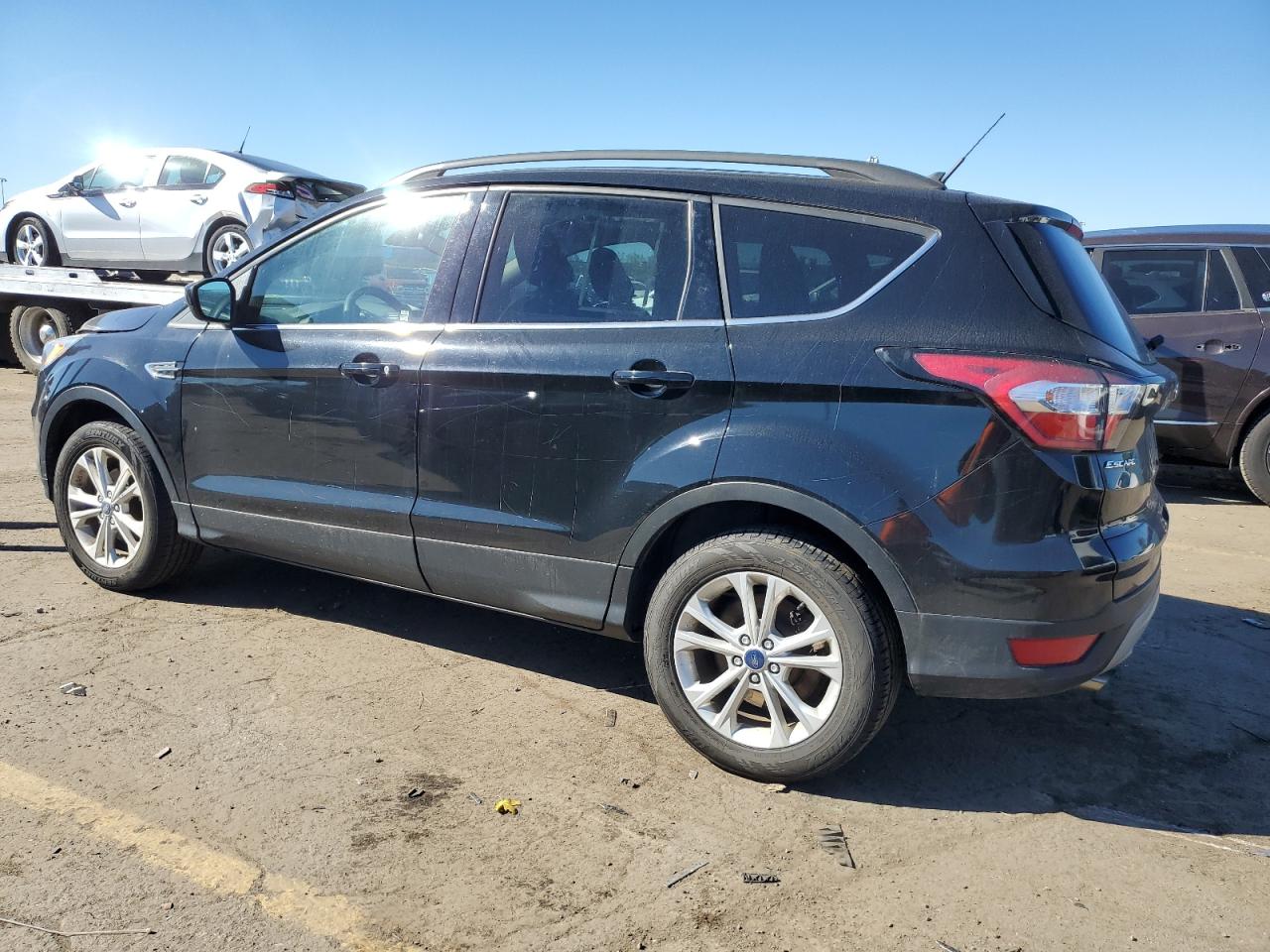 2018 Ford Escape VIN 1FMCU0GD3JUB70689 Copart auction photo, side damage thumbnail 2