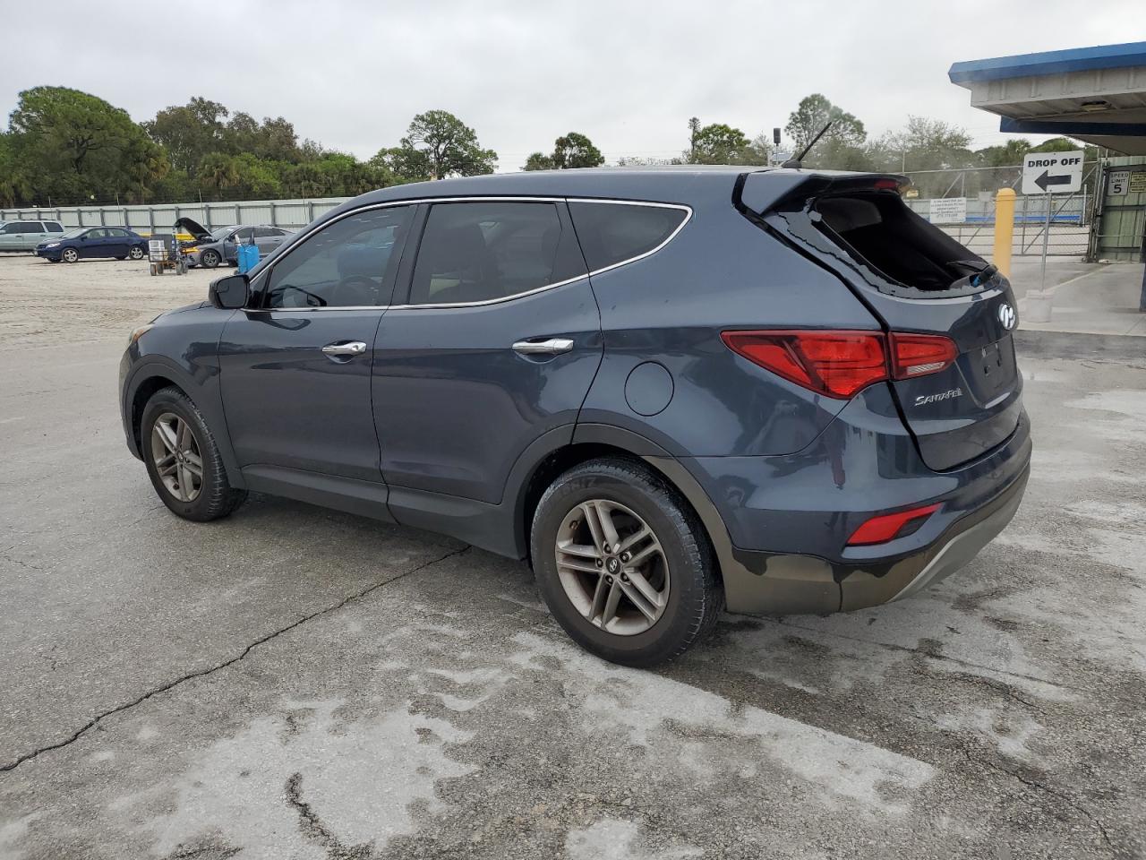 2018 Hyundai Santa Fe VIN 5NMZT3LB2JH082098 Copart auction photo, side / minor dent/scratches damage thumbnail 2