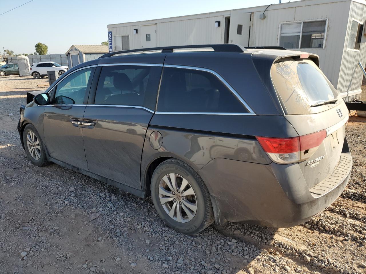 2014 Honda Odyssey VIN 5FNRL5H6XEB017711 Copart auction photo, front end / minor dent/scratches damage thumbnail 2