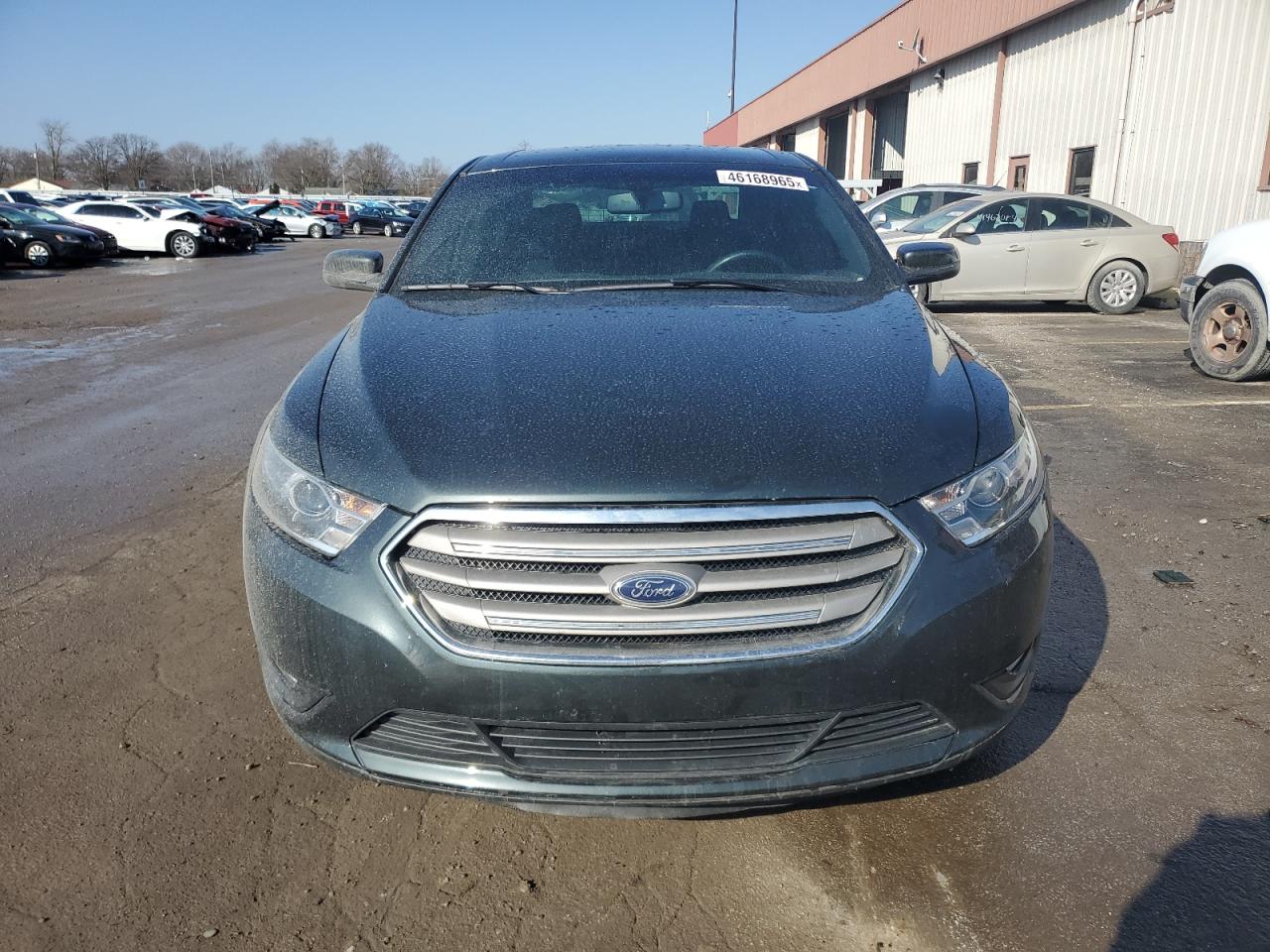 2016 Ford Taurus VIN 1FAHP2E85GG153683 Copart auction photo, undercarriage / minor dent/scratches damage thumbnail 5