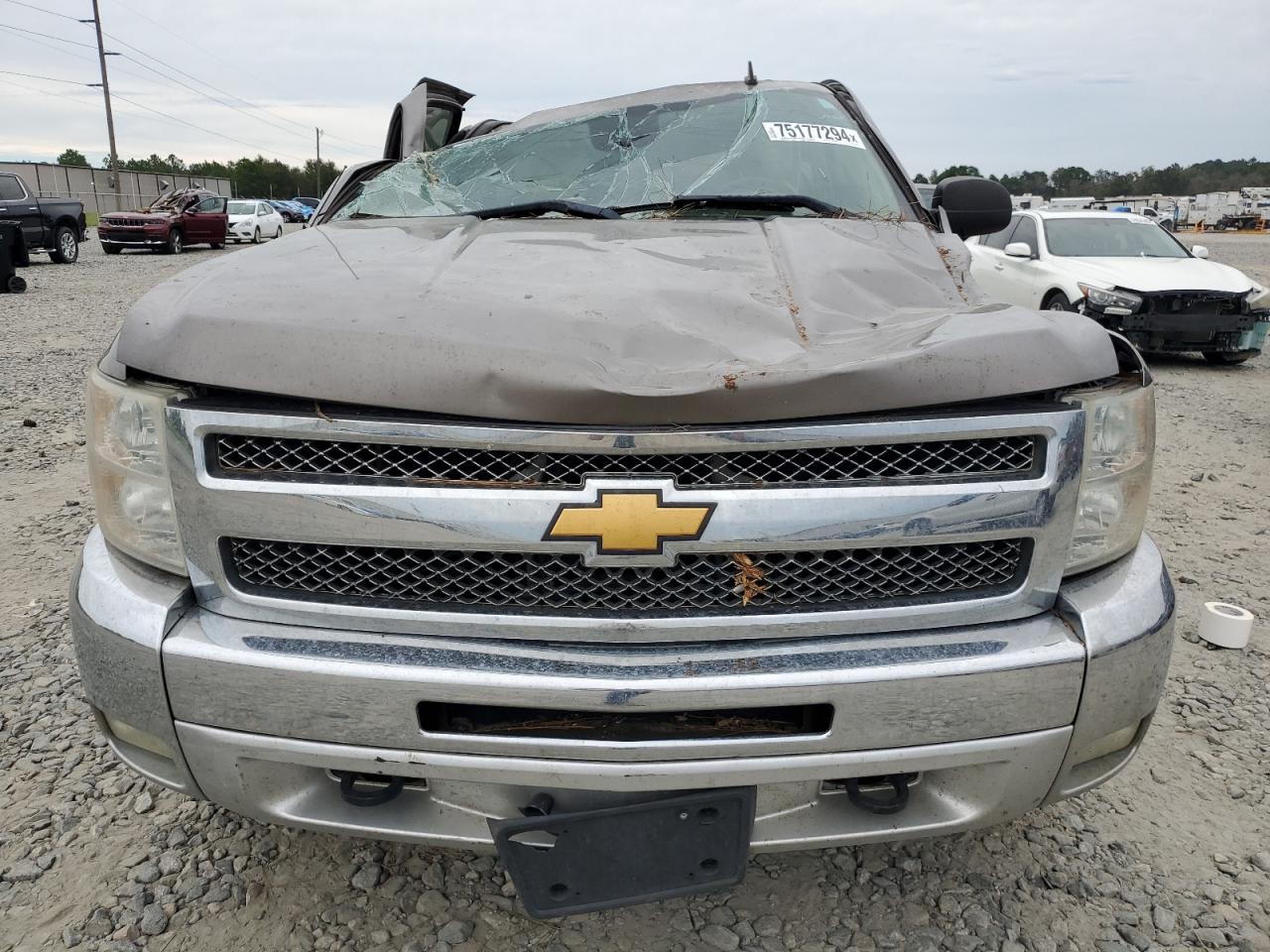 2012 Chevrolet Silverado VIN 3GCPKSE7XCG221390 Copart auction photo, all over damage thumbnail 5