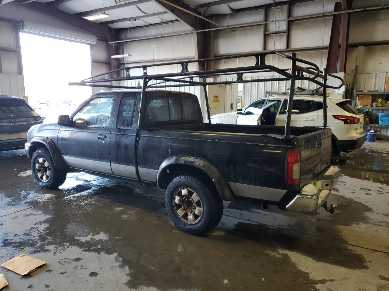 1998 Nissan Navara (Frontier) VIN 1N6DD26Y0WC333060 Copart auction photo, rear end / damage history damage thumbnail 2