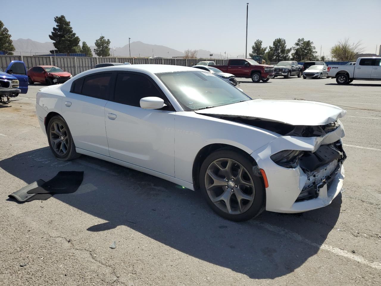 2015 Dodge Charger VIN 2C3CDXHG9FH890700 Copart auction photo, water/flood damage thumbnail 4