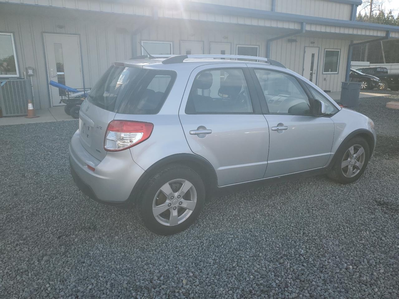2010 Suzuki SX4 VIN JS2YB5A73A6300609 Copart auction photo, side damage thumbnail 3