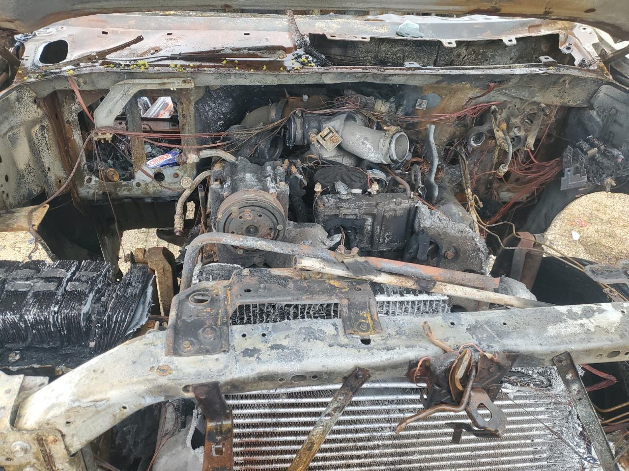 1999 Ford F450 VIN 1FDXF47F6XEE12110 Copart auction photo, burn damage thumbnail 12