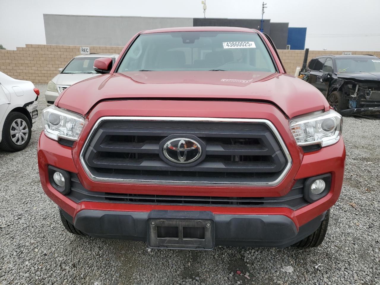 2021 Toyota Tacoma VIN 3TMCZ5AN7MM441394 Copart auction photo, side damage thumbnail 5