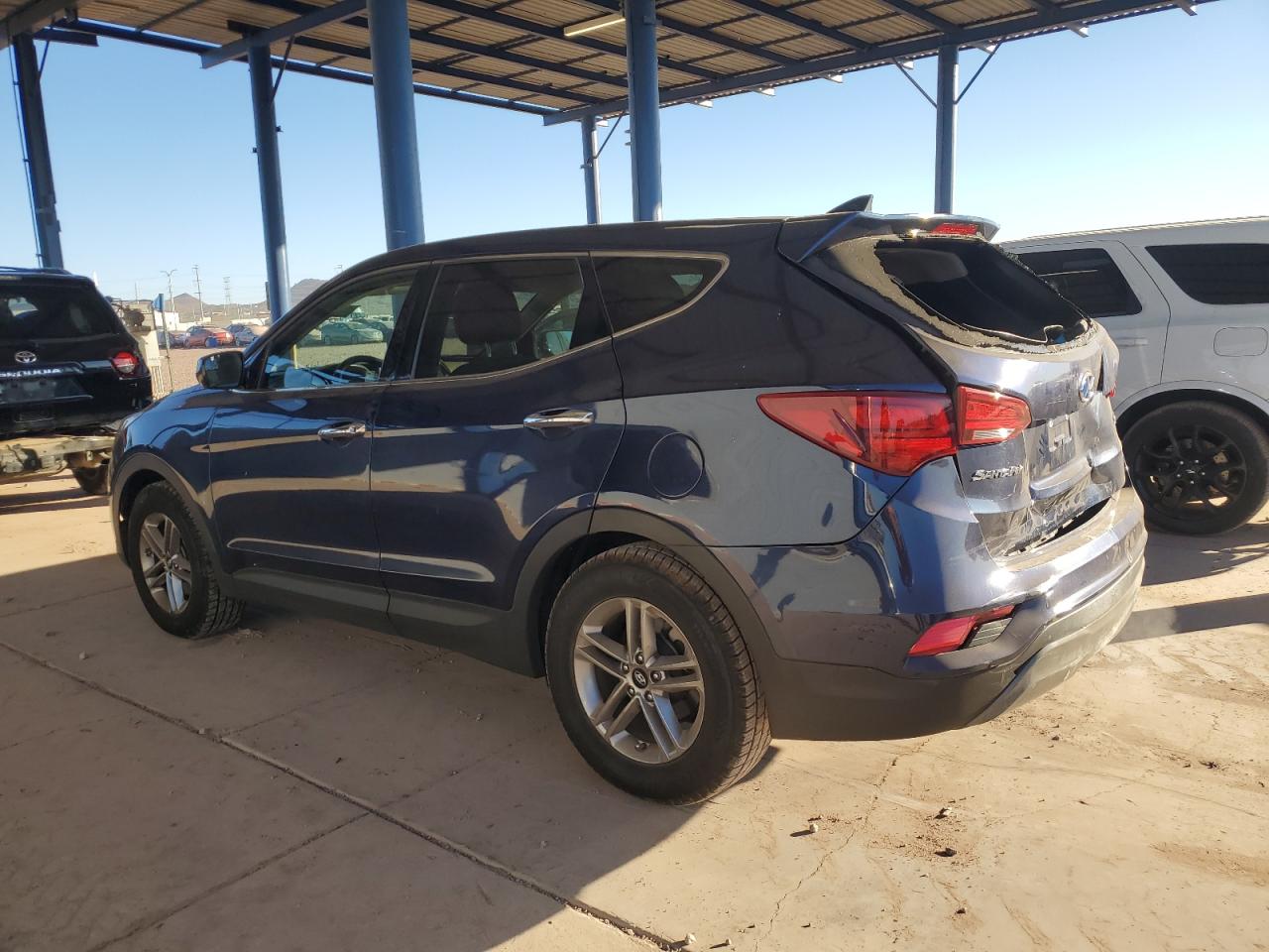 2017 Hyundai Santa Fe VIN 5XYZT3LBXHG465680 Copart auction photo, rear end damage thumbnail 2