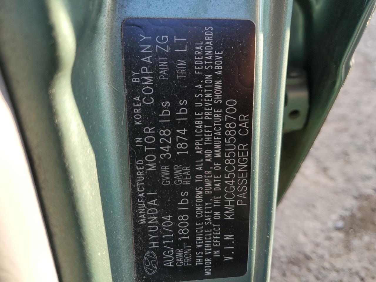 2005 Hyundai Accent VIN KMHCG45C85U588700 Copart auction photo, side / minor dent/scratches damage thumbnail 12