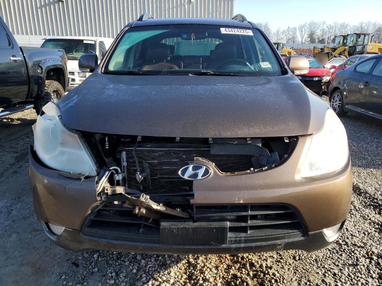 2011 Hyundai Veracruz VIN KM8NUDCC6BU144165 Copart auction photo, front end damage thumbnail 5