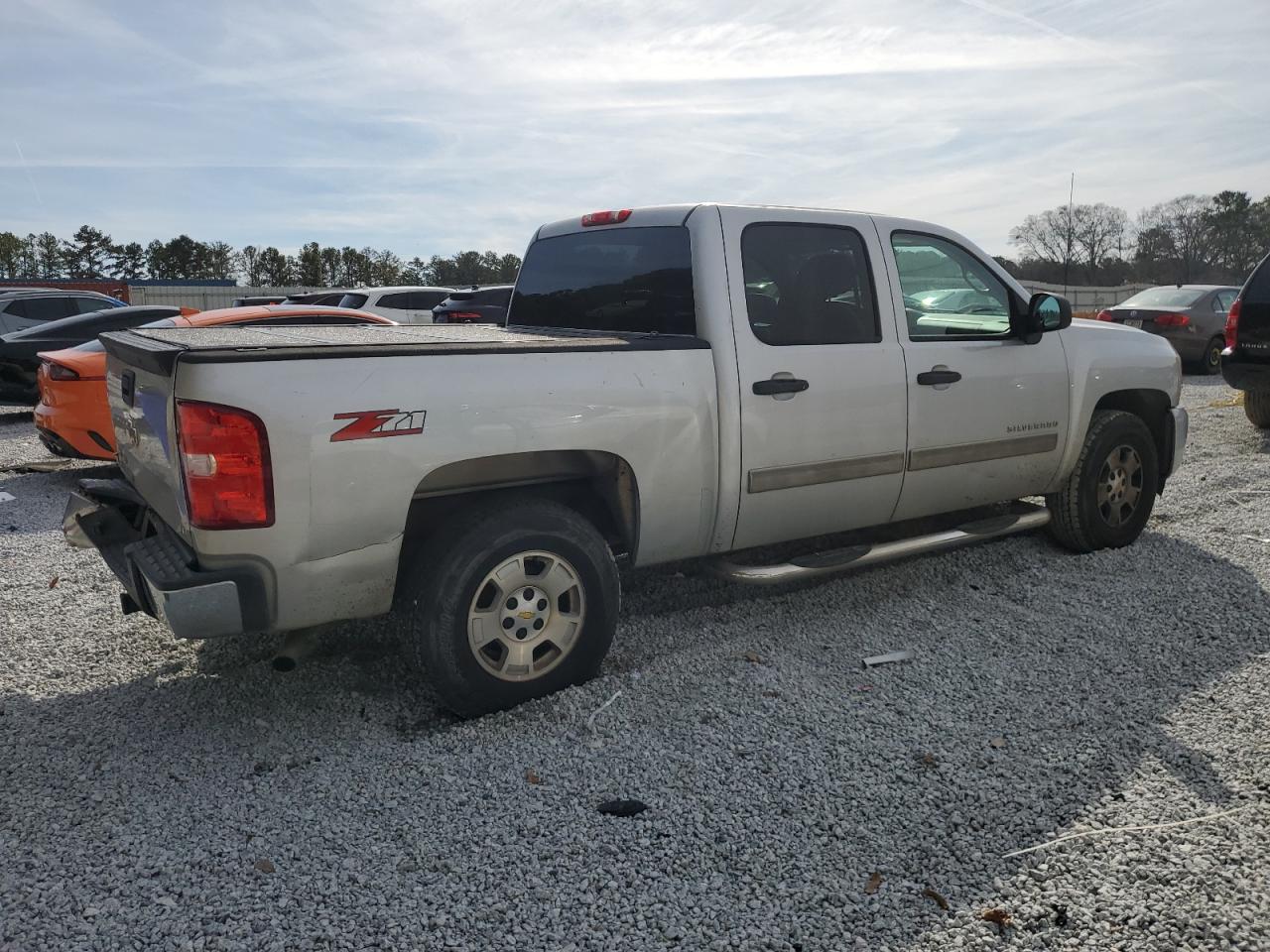 2011 Chevrolet Silverado VIN 3GCPCSE05BG206360 Copart auction photo, rear end damage thumbnail 3