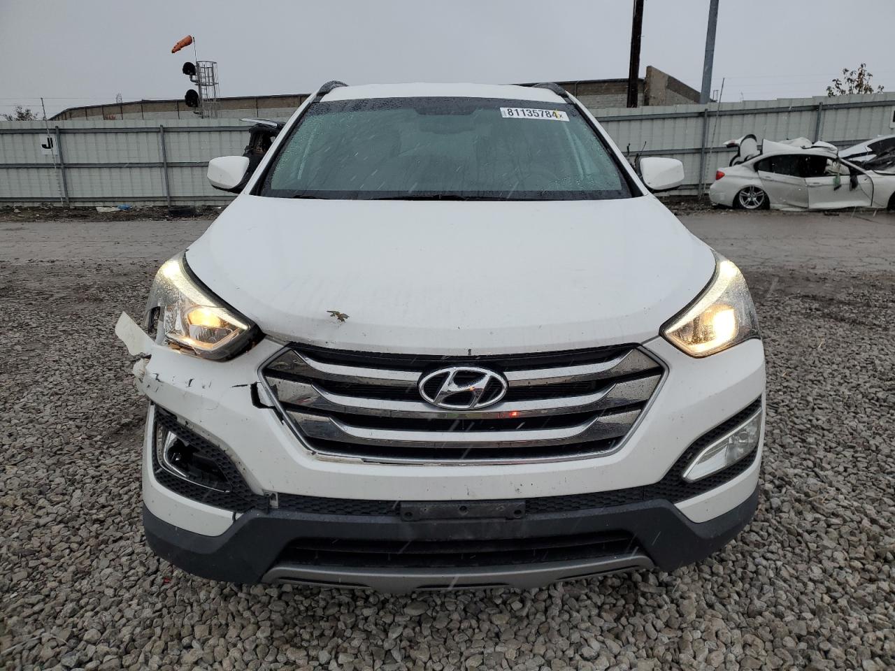 2015 Hyundai Santa Fe VIN 5XYZU3LBXFG269670 Copart auction photo, front end damage thumbnail 5
