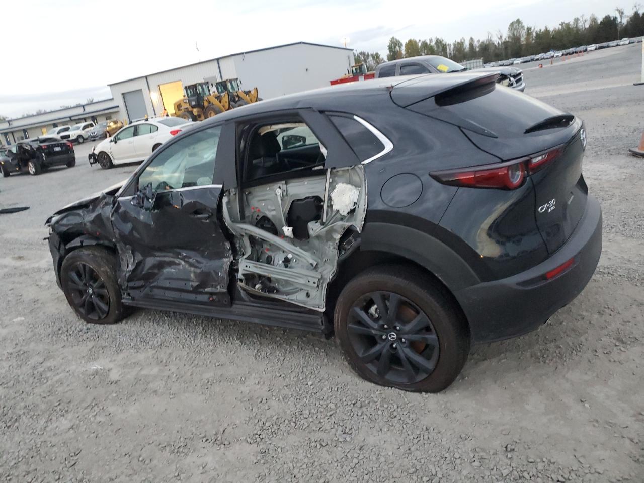 2024 Mazda CX-30 VIN 3MVDMBBM6RM658044 Copart auction photo, all over damage thumbnail 2