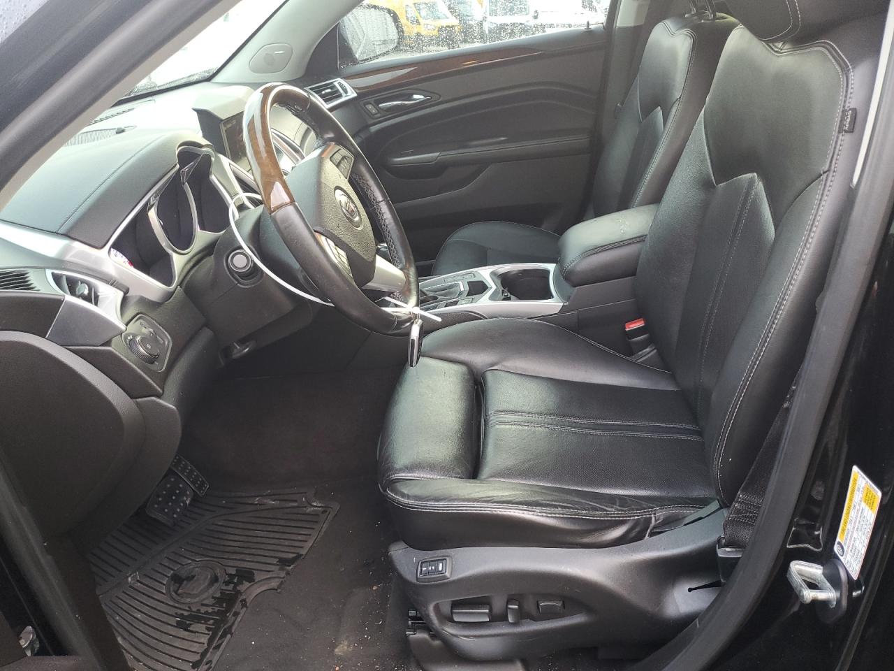 2012 Cadillac SRX VIN 3GYFNBE3XCS506632 Copart auction photo, front end / undercarriage damage thumbnail 7