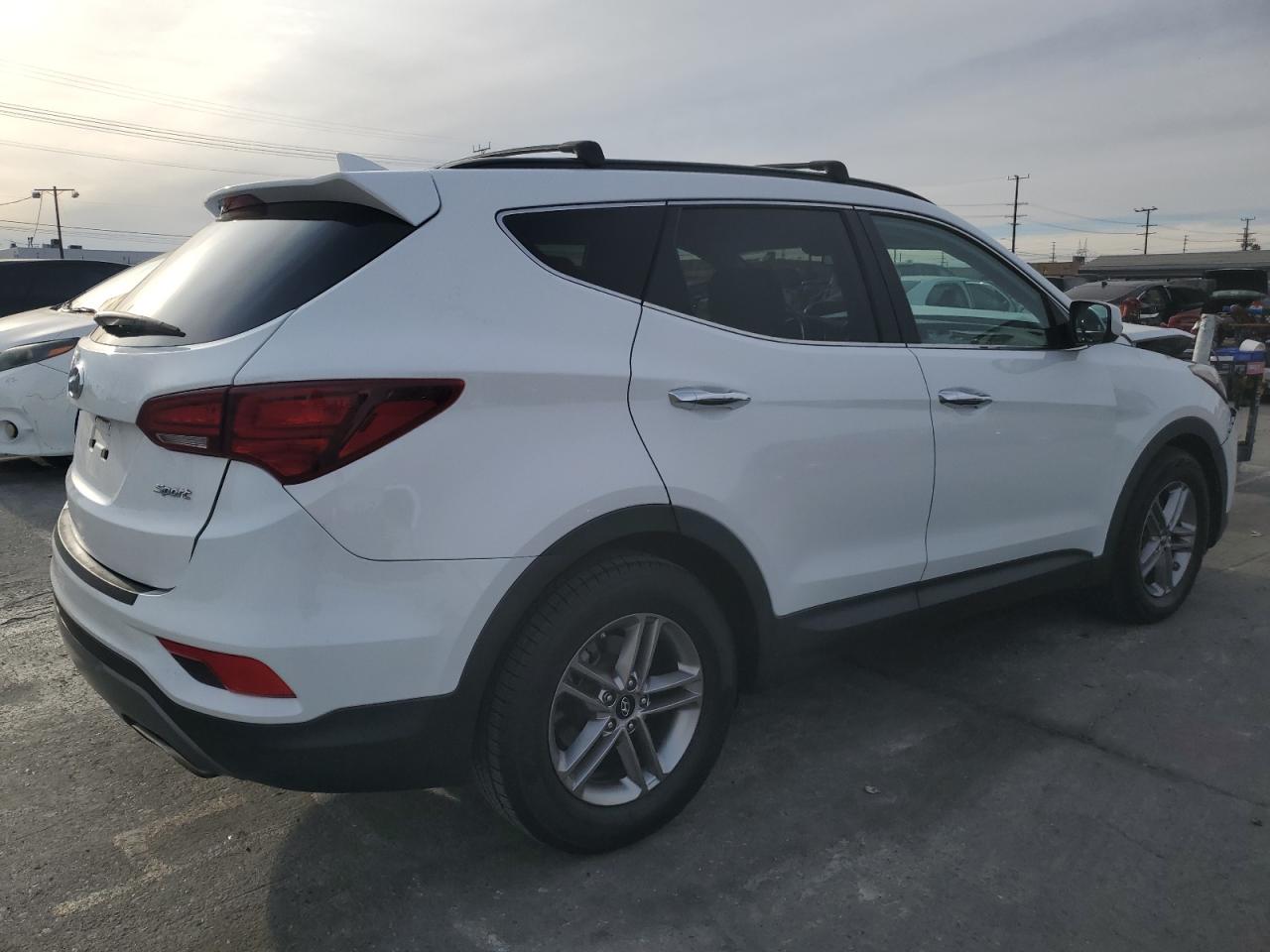2017 Hyundai Santa Fe VIN 5NMZU3LB9HH015859 Copart auction photo, front end damage thumbnail 3