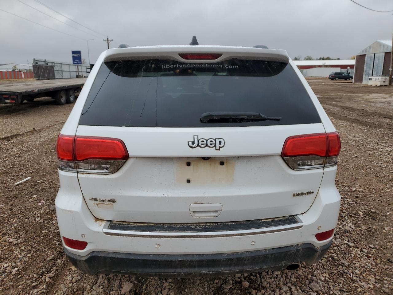 2015 Jeep Grand Cherokee VIN 1C4RJFBG8FC158773 Copart auction photo, side / front end damage thumbnail 6