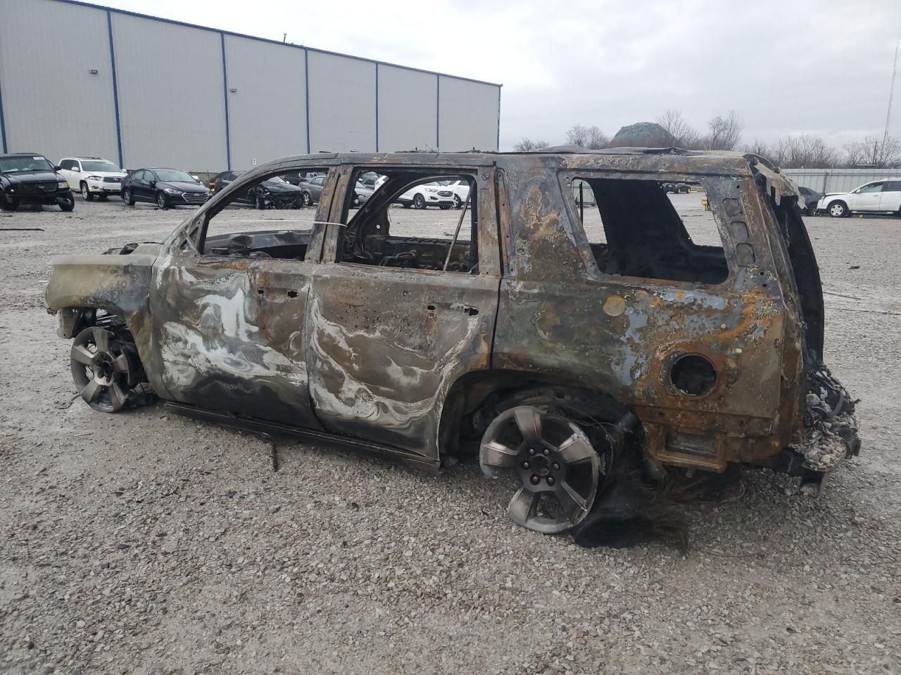2019 Chevrolet Tahoe VIN 1GNSKCKC5KR276725 Copart auction photo, burn damage thumbnail 2