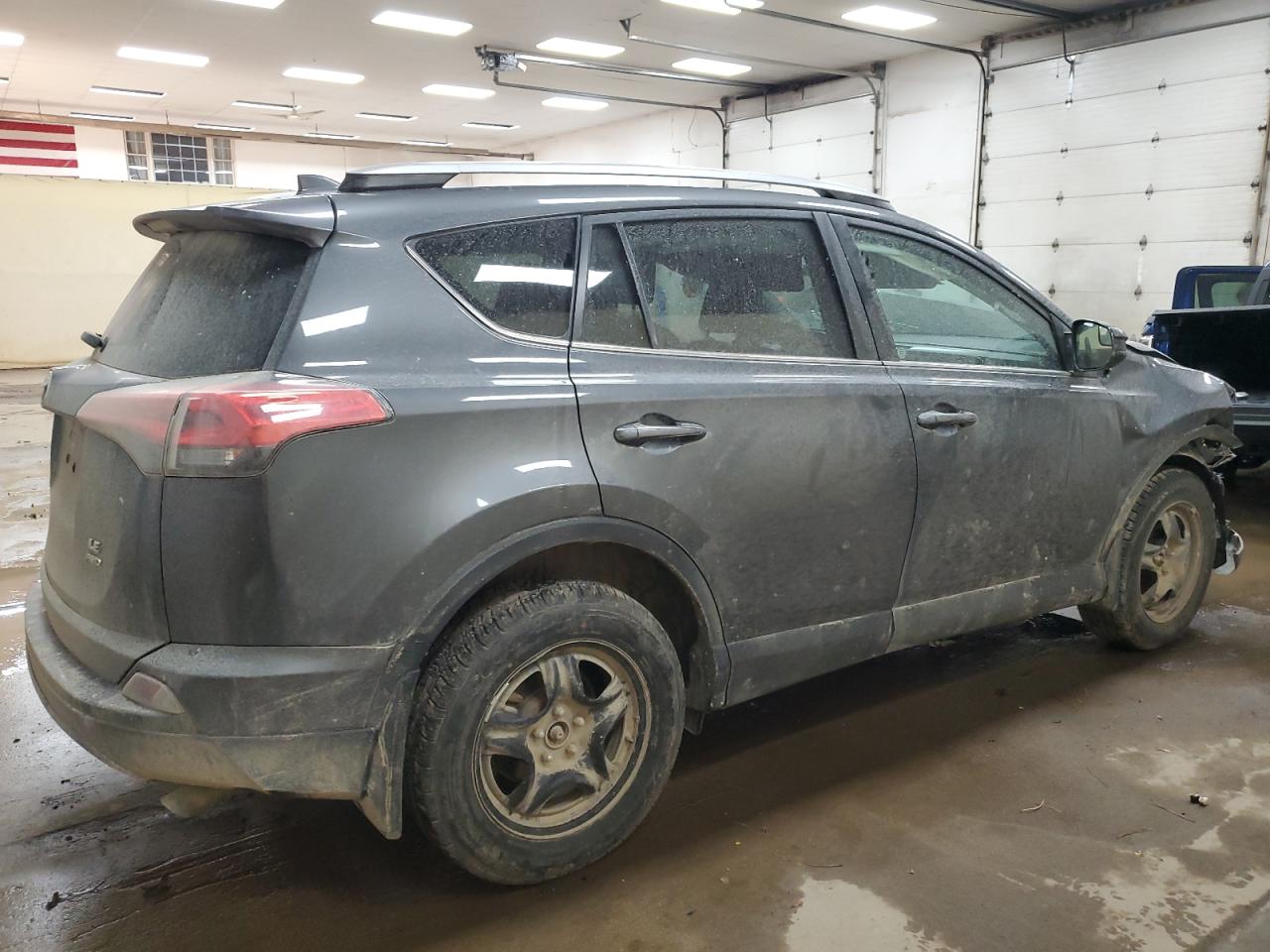 2018 Toyota RAV 4 VIN 2T3BFREV1JW779518 Copart auction photo, front end / side damage thumbnail 3